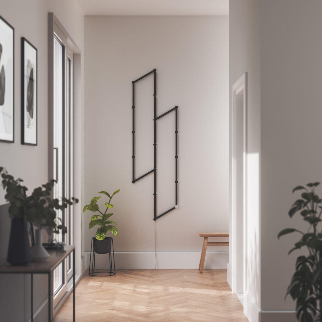 Nanoleaf Lines Entryway With Matte Black Skins OFF https://staging.mkaugaming.com/nanoleaf-lines-skins-introducing-snap-on-covers-to-customise-your-lighting-experience/
