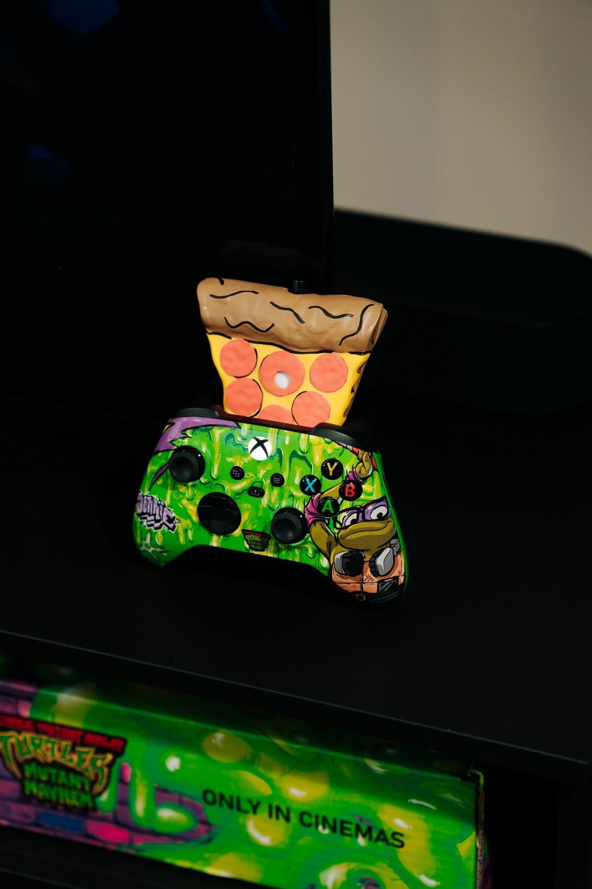 World’s First Pizza-Scented Controller From Xbox & Paramount Pictures’ “Teenage Mutant Ninja Turtles: Mutant Mayhem” 6 2023 07 25 00006 https://staging.mkaugaming.com/worlds-first-pizza-scented-controller-from-xbox-paramount-pictures-teenage-mutant-ninja-turtles-mutant-mayhem/